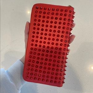 Red Christian Louboutin spiked Waller
